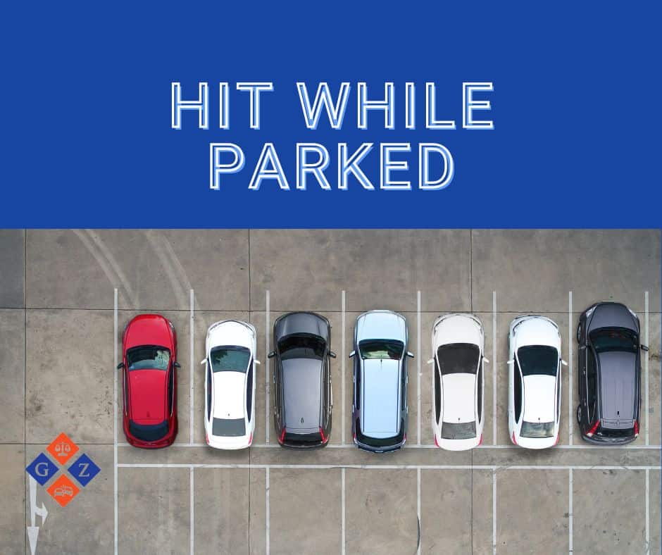 Hit while parked parking lot accident legal settlement car crash attorney law firm.